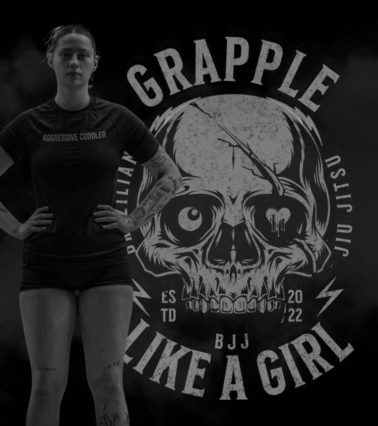 Woman wearing black grappling apparel with a Grapple Like a Girl skull graphic background